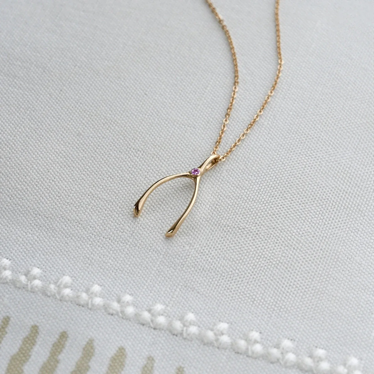 Small Pink Sapphire Wishbone Pendant in Solid 14k Gold (October) - Image 3
